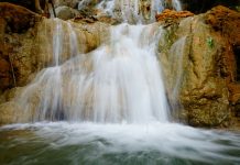 น้ำตกวังโต๊ะยิ้ม เห็นแล้วต้องยิ้ม ถูกพบท้ายป่าหมู่บ้าน